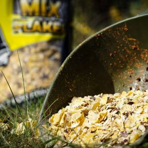 El Pro Elite Baits Mix Flakes natural, versátil y de gran poder de atracción, especialmente formulado para pescadores que buscan crear zonas de alimentación