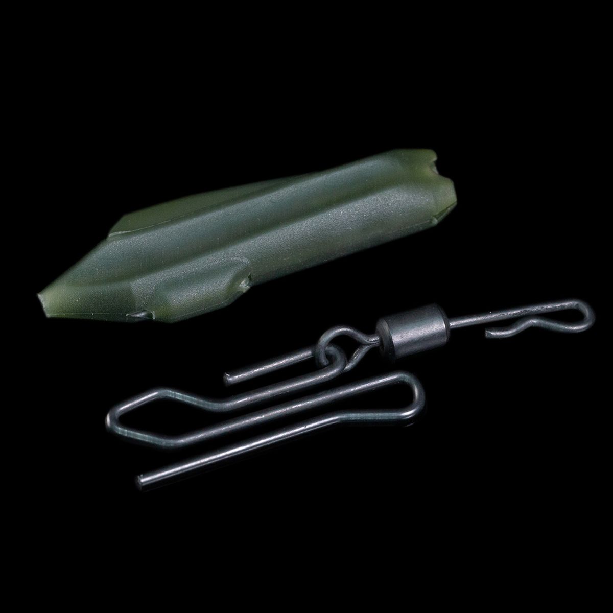 El RidgeMonkey Connexion Uni Lead Clip Camo Green permite al pescador decidir fácilmente si desea liberar o retener el plomo.