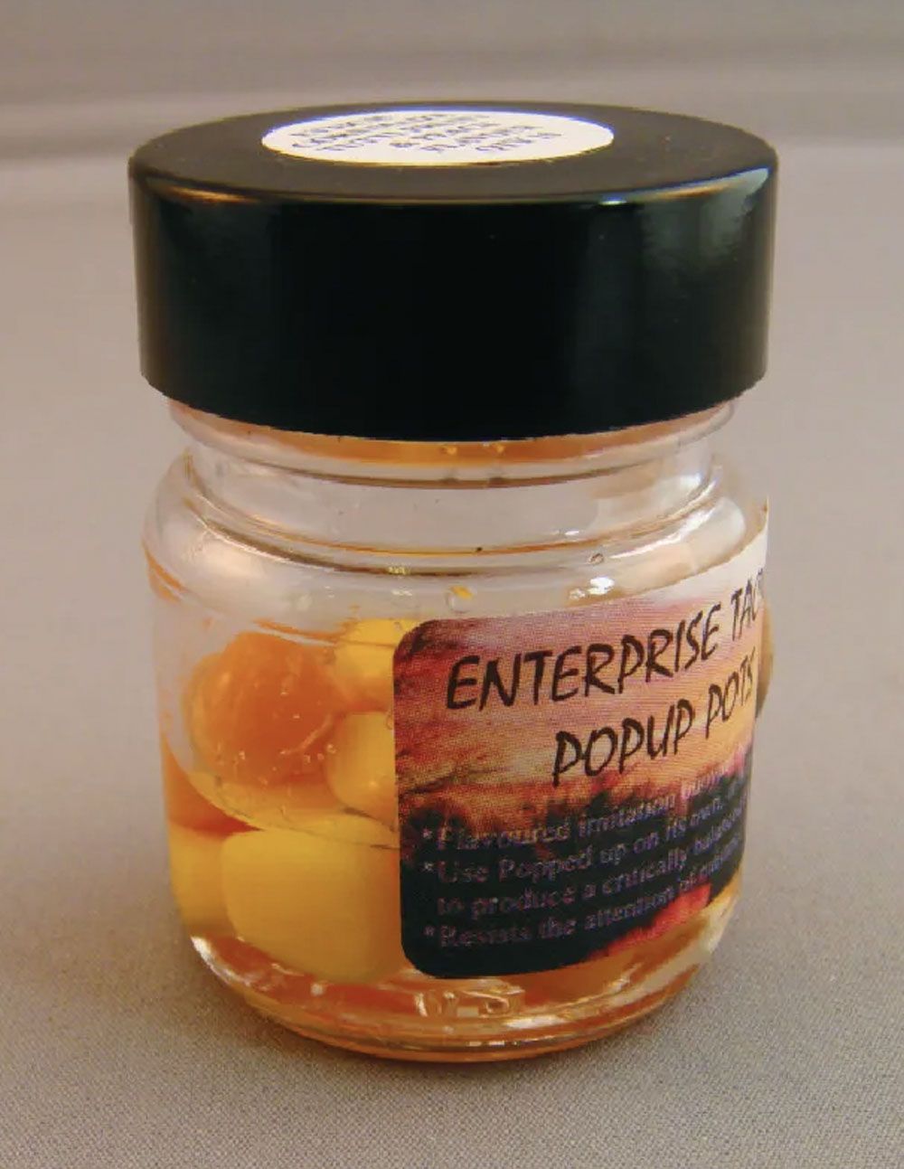 Enterprise Tackle Pop Up Pots Pellets 10, 14 y 18mm Sabor Cangrejo & Ajo - Imagen 2