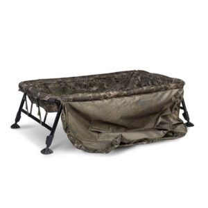 Nash Moqueta Cuna Hi-Protect Camo Monster es la elección definitiva para pescadores de carpfishing que buscan máxima seguridad y comodidad.